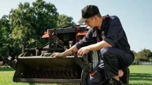 man using a heavy duty lawn mower he rented from Strait Way in Coaldale